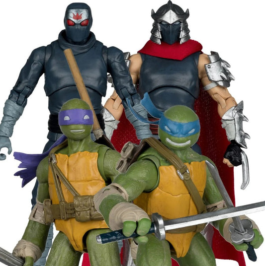 Four action figures of Teenage Mutant Ninja Turtles with masks and weapons on a white background