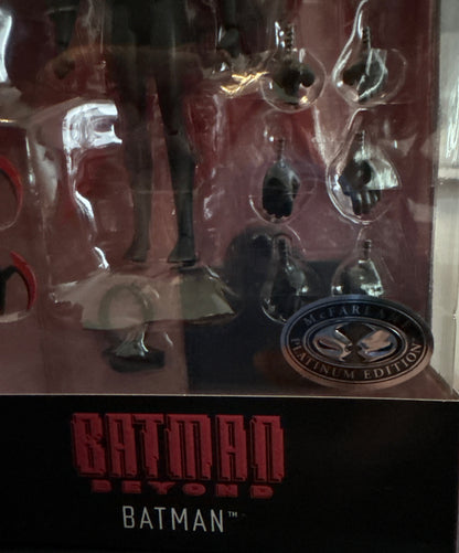 Packaged product with 'Batman' branding on a reflective surface
