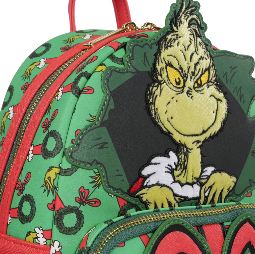Backpack with a Grinch character design on a white background