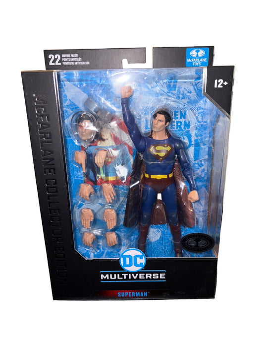 Superman action figure in packaging with DC Multiverse branding on a blurred background